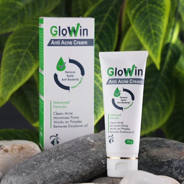 Glowin Anti Acne Cream packaging with tube and box on a natural background
