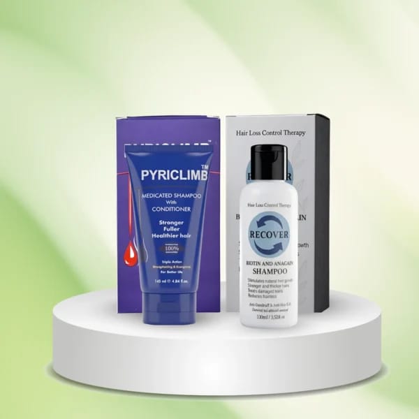 Pyriclimb shampoo and Recover hair care products on a white pedestal with a green gradient background